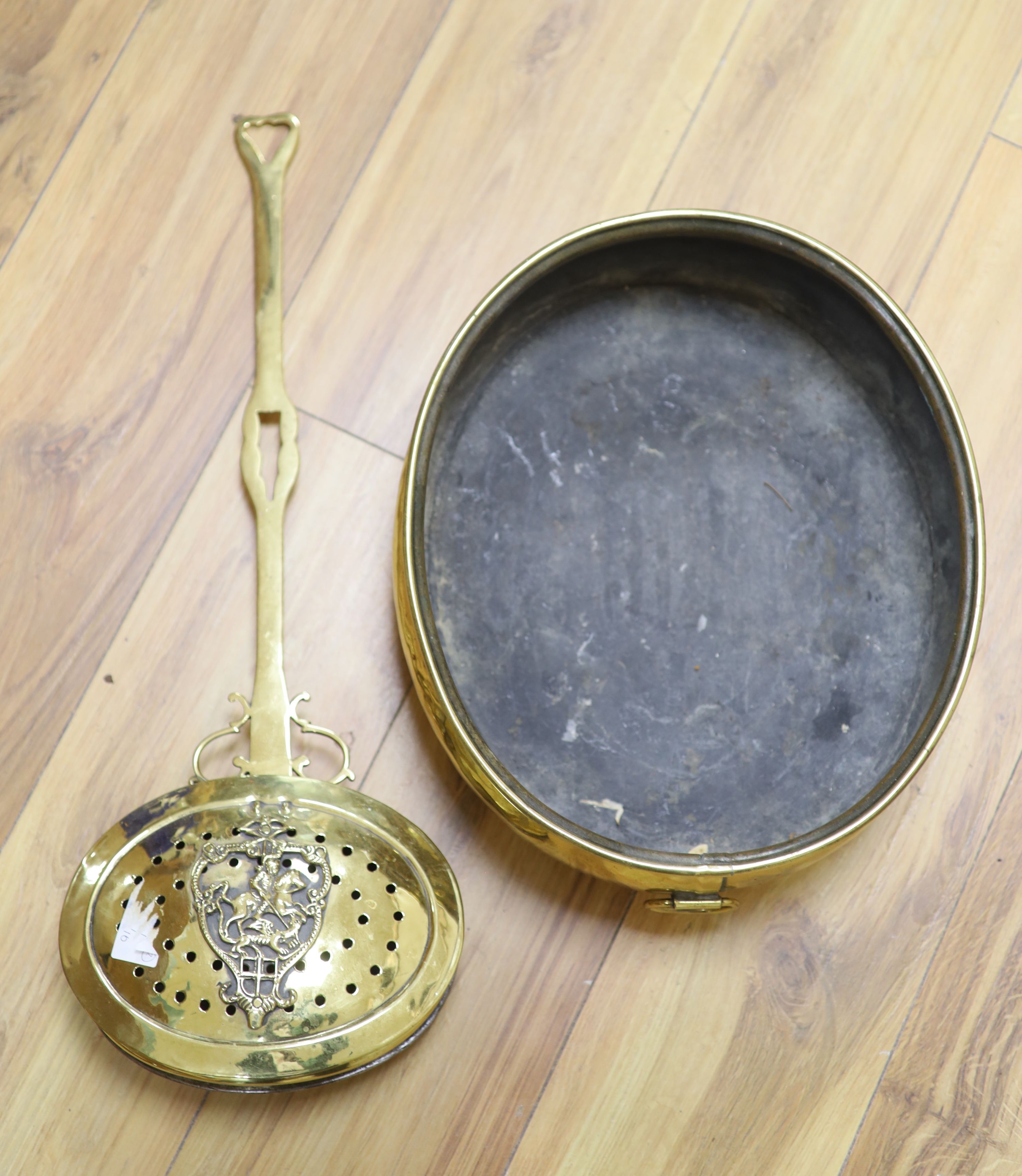 A 19th century oval brass planter and chestnut roaster